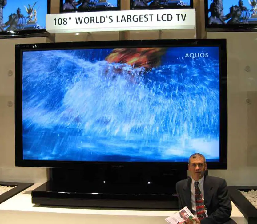 Телевизоры 108 см купить. Sharp lb-1085. 108 Дюймов телевизор. 108 Телевизор в дюймах. Самый большой телевизор Sharp.