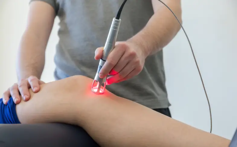 Laser,Therapy,On,A,Knee,Used,To,Treat,Pain.,Selective