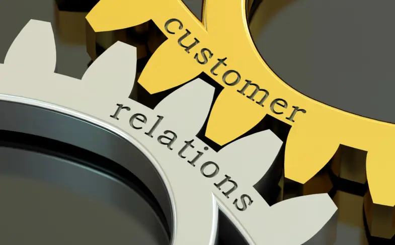 Customer Relations concept on the gearwheels, 3D rendering