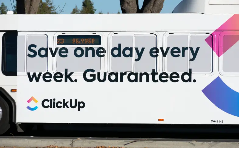 ClickUp advertisement on the bus exterior is building brand awareness. ClickUp is a customizable productivity platform – San Jose, California, USA – 2020