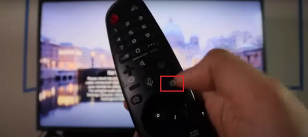 navigate to the  "Settings" option on the TV screen.