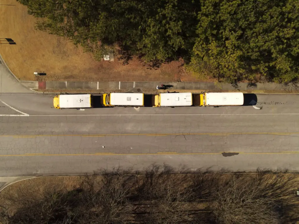 Four School Buses